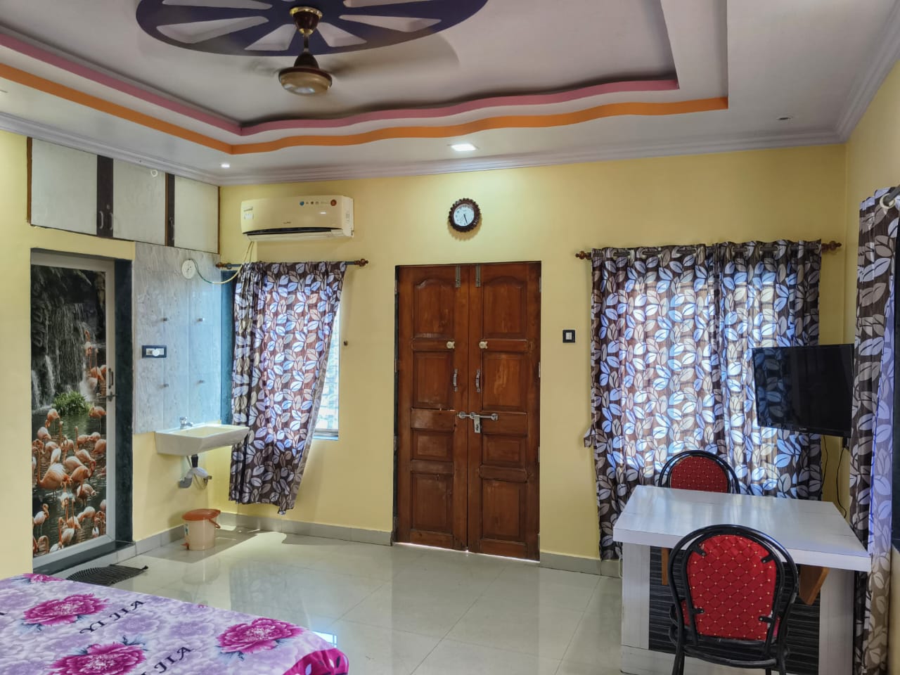 Swarna Palace lodging devgad spacious rooms with separate dining space