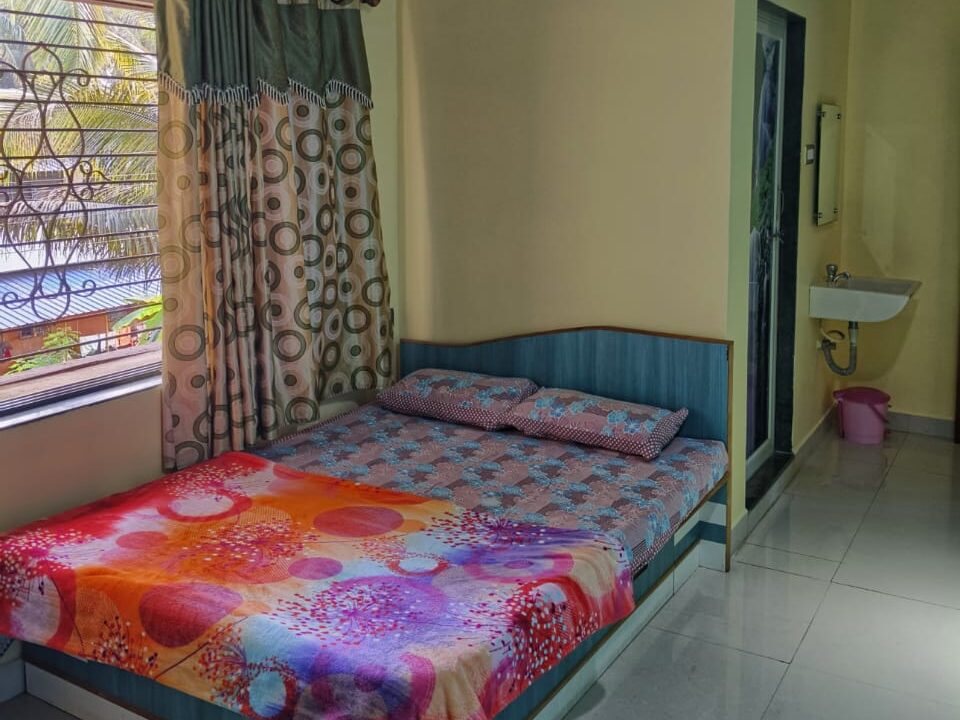 Swarna Palace lodging devgad spacious rooms