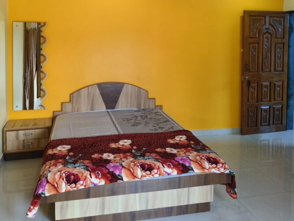 Swarna Palace lodging devgad spacious rooms with attached gallery.
