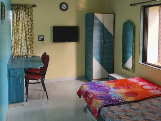 Swarna Palace lodging devgad spacious rooms with separate dining space