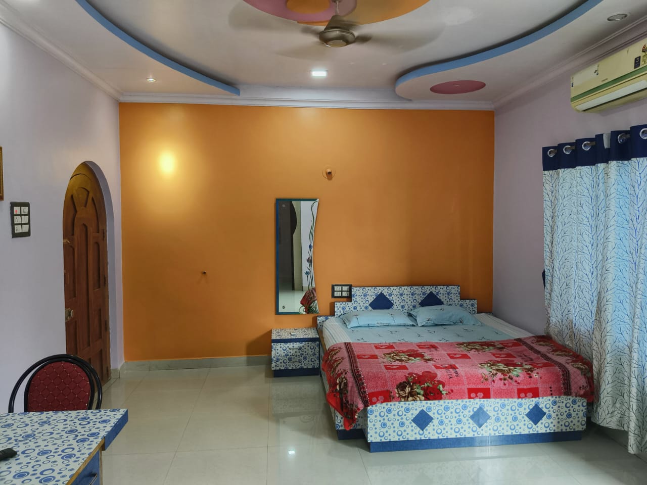 Swarna Palace lodging devgad spacious rooms with attached gallery.