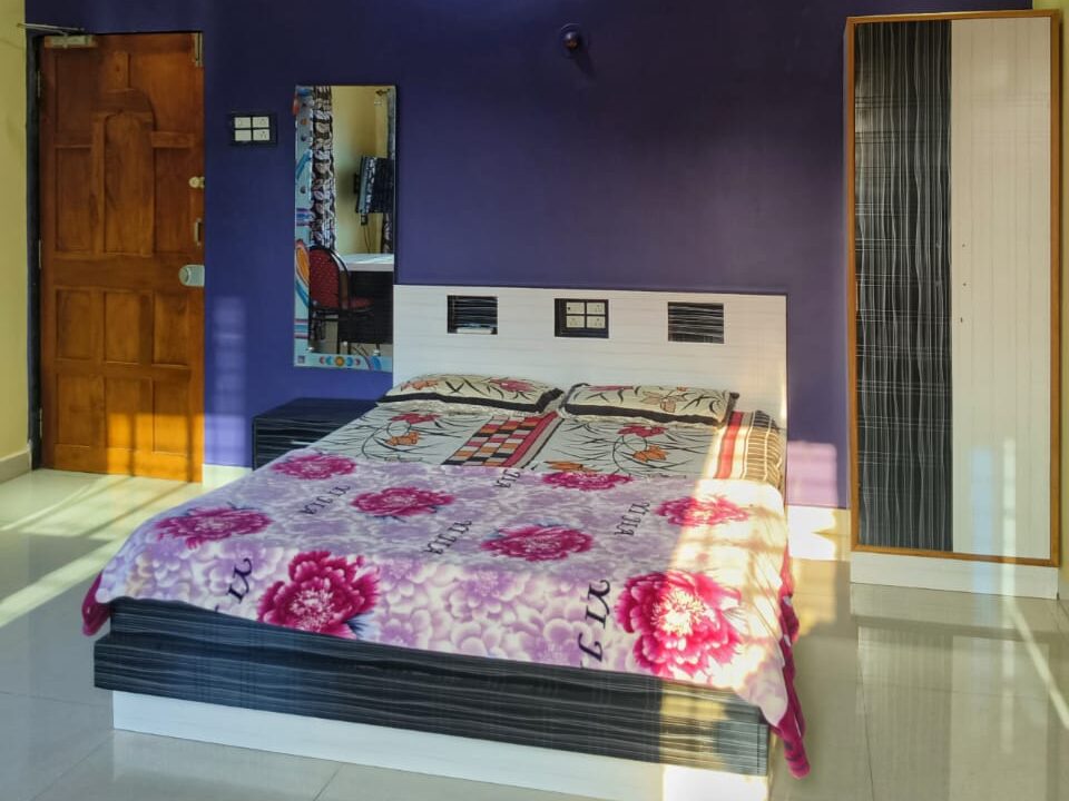 Swarna Palace lodging devgad spacious rooms with attached gallery.