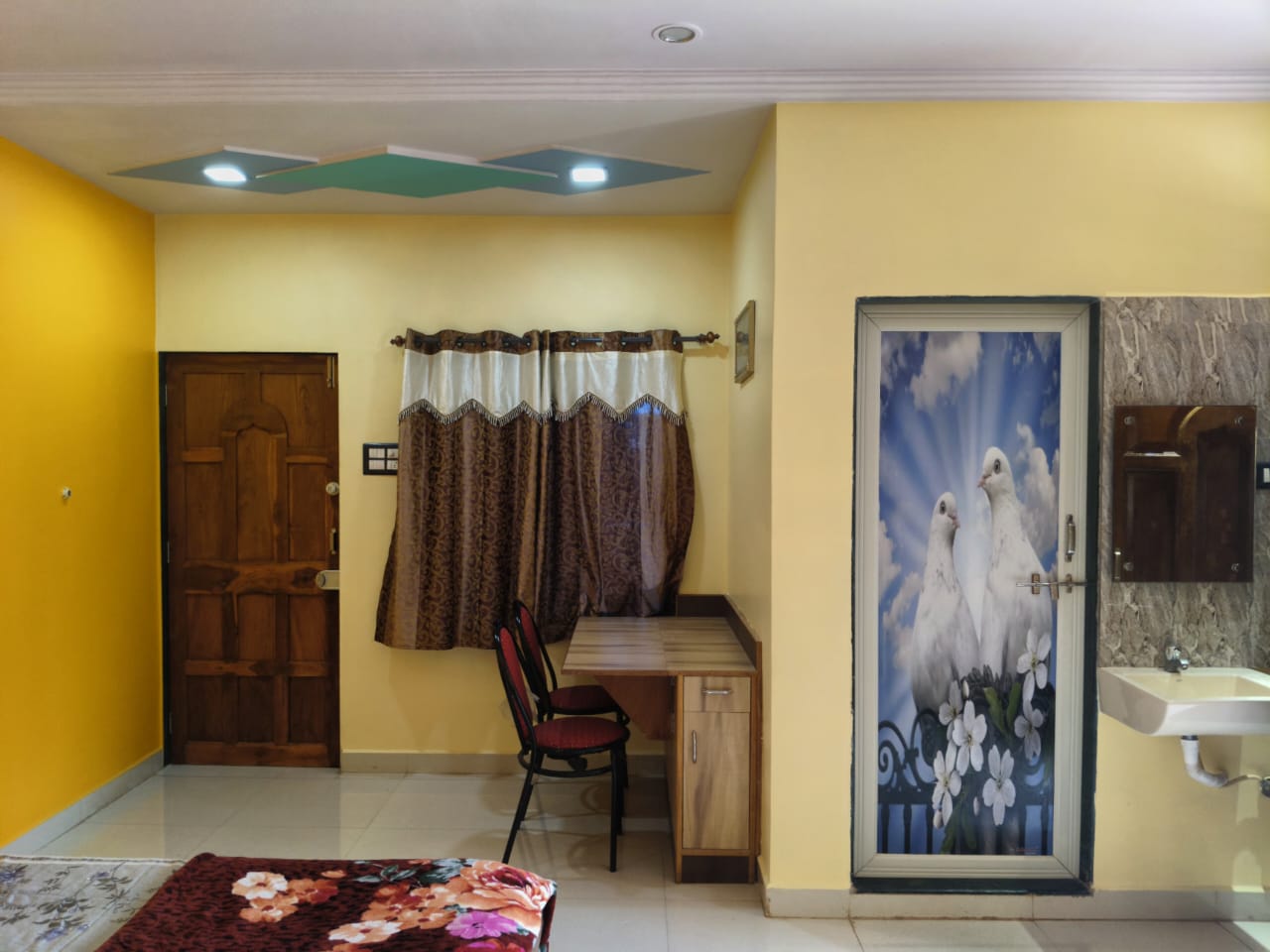 Swarna Palace lodging devgad spacious rooms with separate dining space