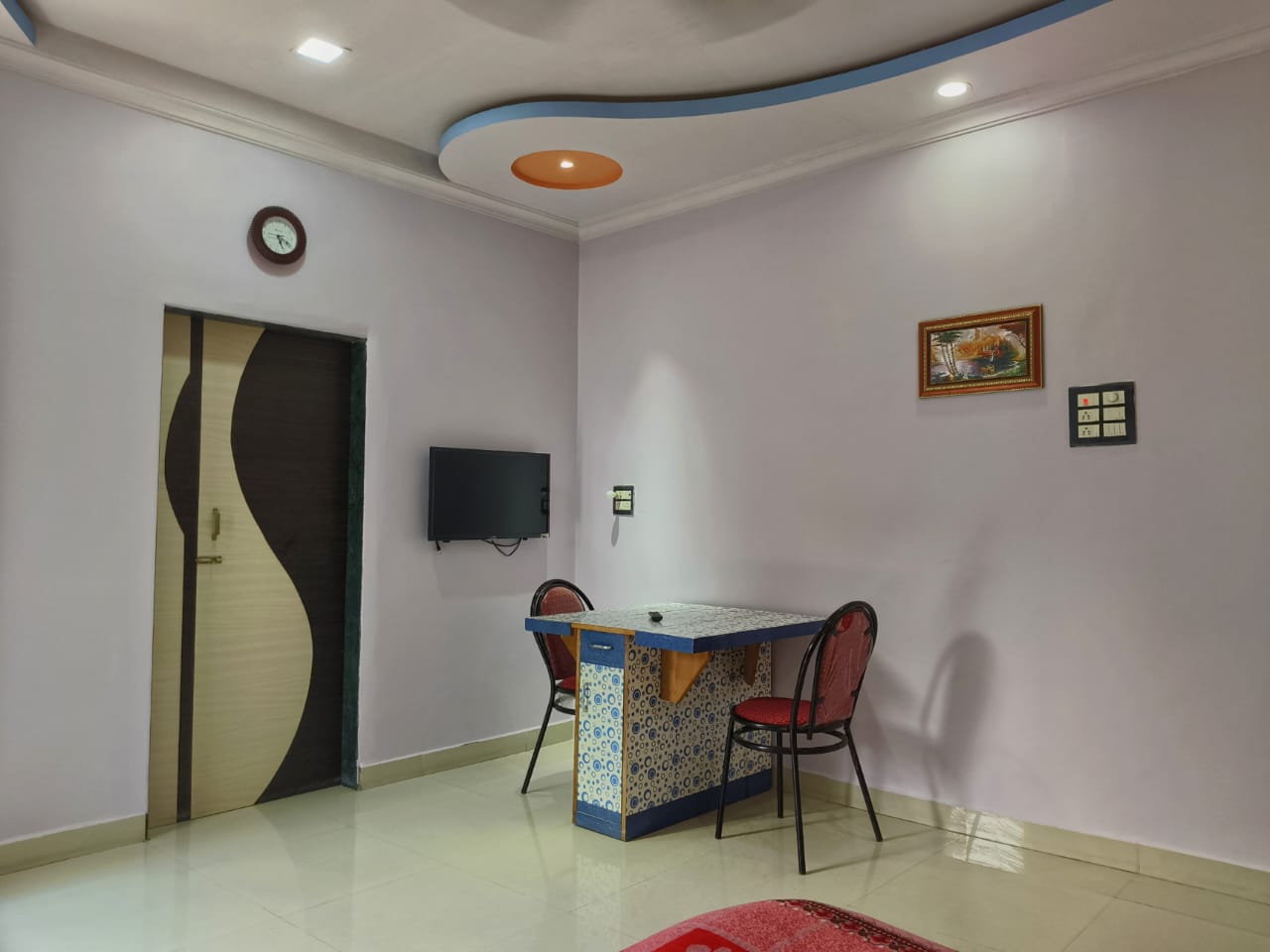 Swarna Palace lodging devgad spacious rooms with separate dining space